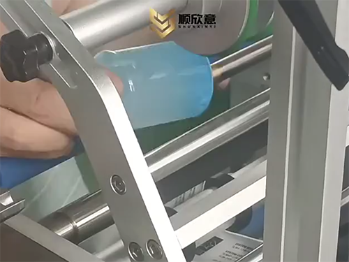 半自动化妆瓶圆瓶贴标...